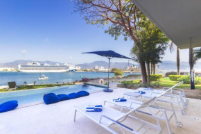 Capitalia - Award Wining Villa with Private Pool, Beach and Staff